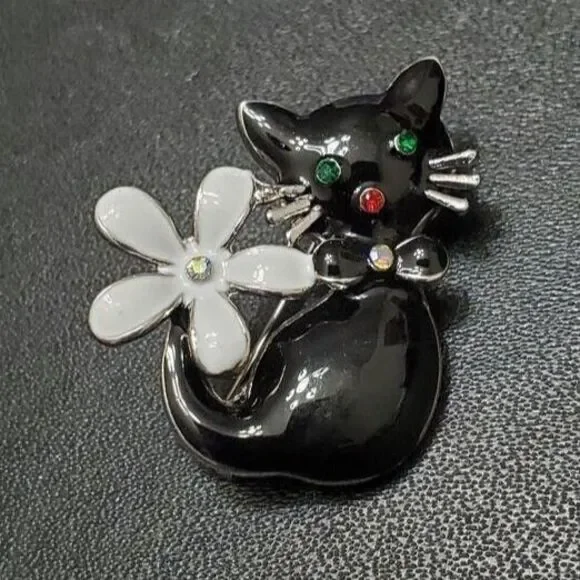 Black enamel kitty cat brooch