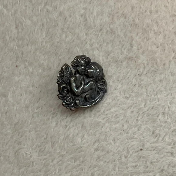 Elegant Silver Cherub Brooch