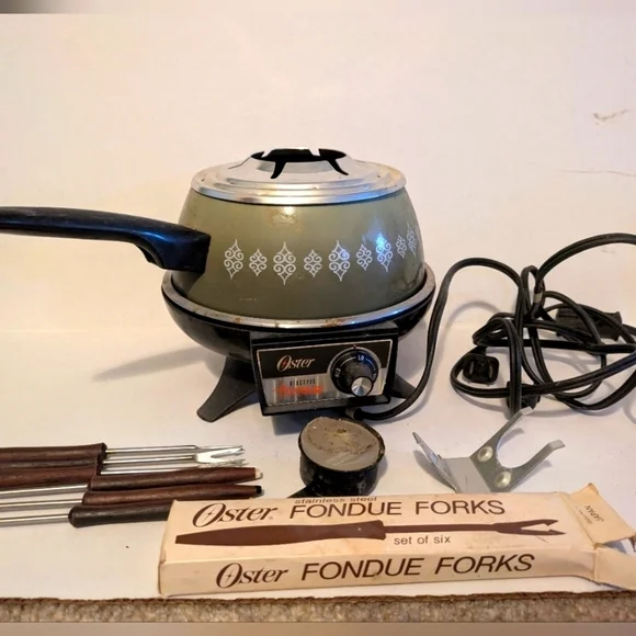 Vintage Oster Electric Fondue Set with forks.