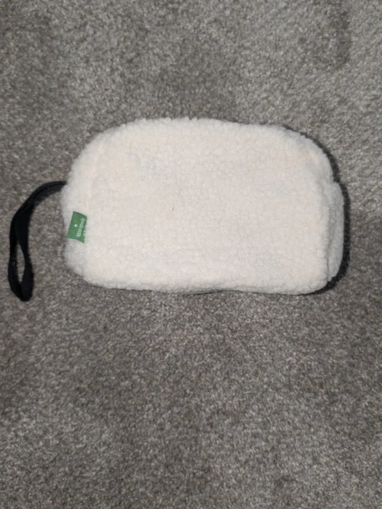 kate spade Cream Sherpa Wristlet Pouch with Black Strap