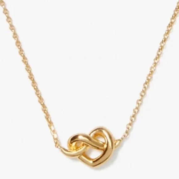 $58 Kate Spade loves me knot heart pendant in gold
