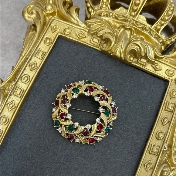 Elegant Gold and Jewel-Toned Brooch