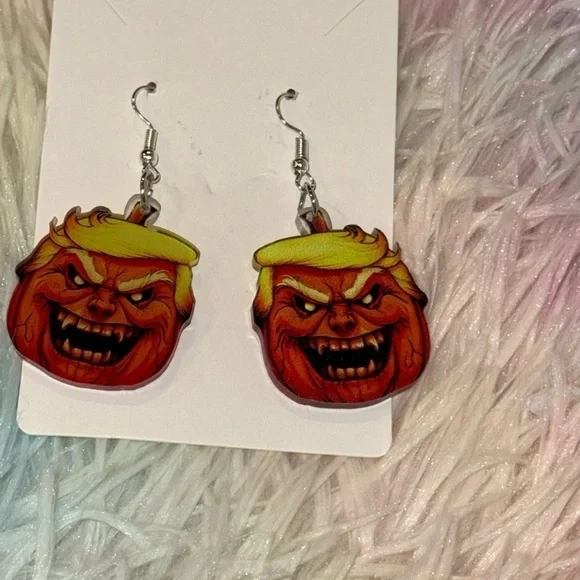 scary pumpkin face earrings  don't unless sided