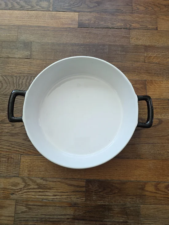 White Stoneware Casserole Dish with Black Handles