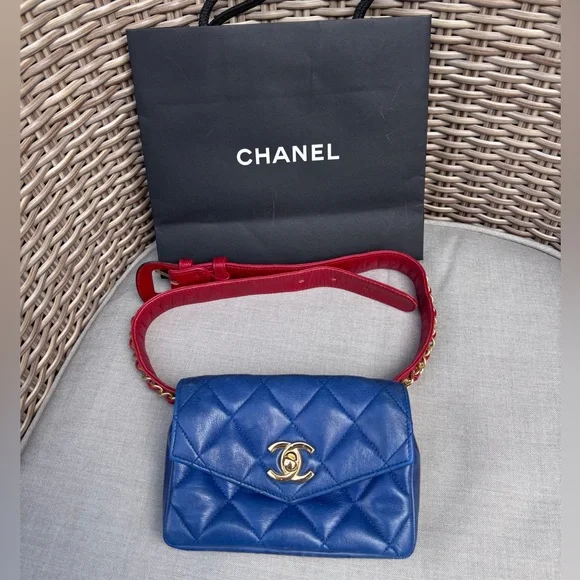 CHANEL Blue Quilted Mini Bag with Red Strap