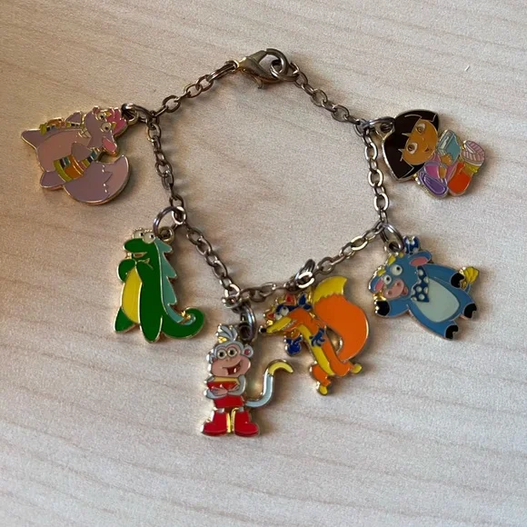 Nickelodeon Dora the explorer kids bracelet with 6 enamel characters.