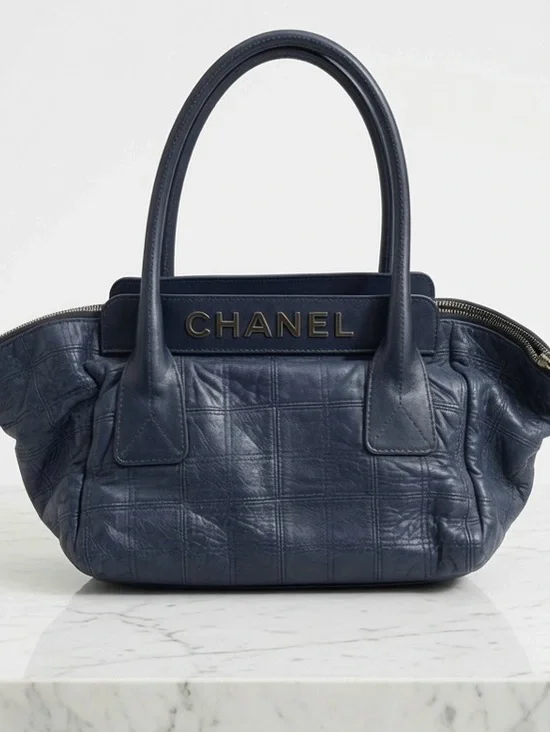 CHANEL Blue Quilted Leather Tote with Logo Plaque