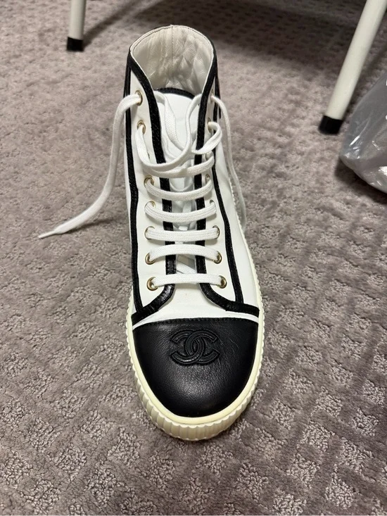 CHANEL White and Black High-Top Logo Sneaker