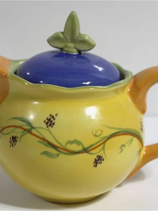 Pfaltzgraff Yellow Ceramic Lidded Jar with Blue Lid and Green Finial