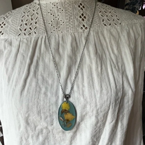 Elegant Silver Necklace with Yellow Floral Pendant