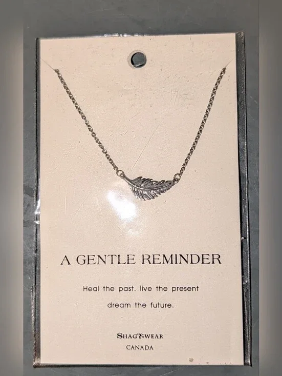 NWT Inspirational Silver Dainty Feather Necklace necklace.