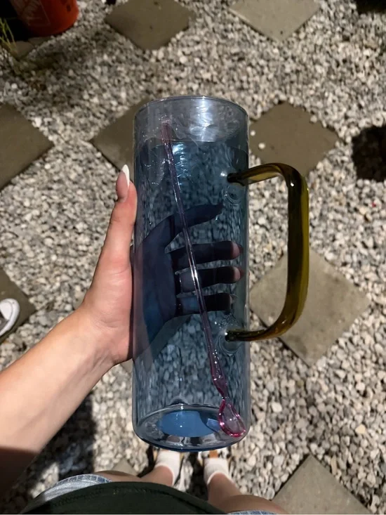 Tall Blue Glass Mug with Olive Handle and Pink Stirrer