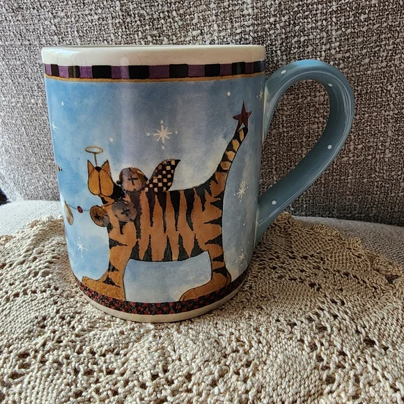 Williraye Studio cup with tiger/cat, star and angel