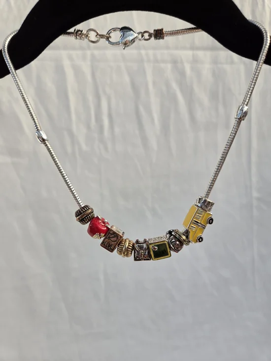 Silver Charm Necklace with Yellow Taxi and Red Apple Accent