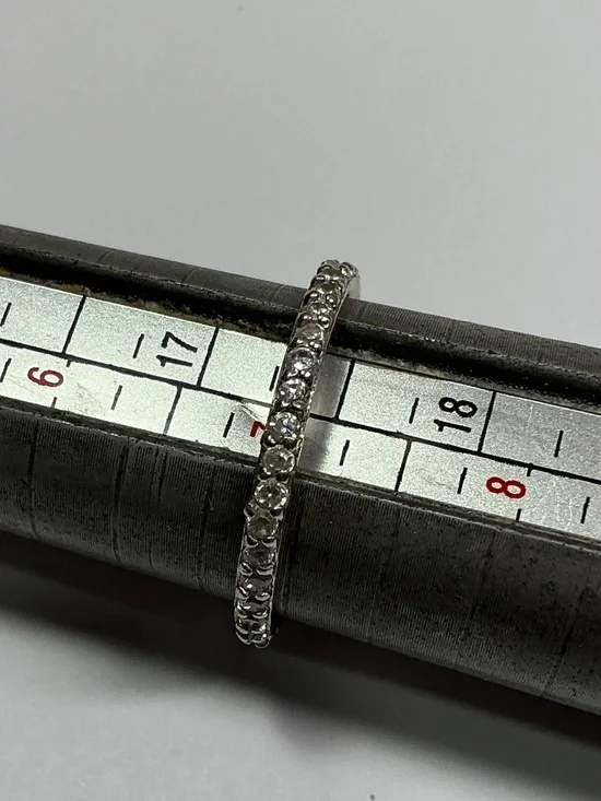 FAS Sterling Silver Ring with clear stones. Size 7
