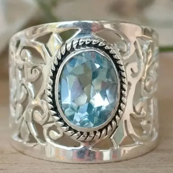 Ring band with ocean blue stone