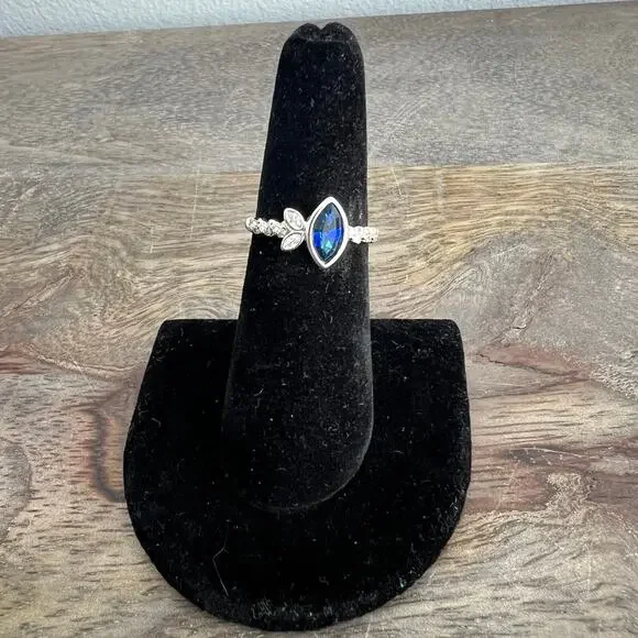 Sapphire blue colored crystal studded elegant ring on silver tone band size 6.25