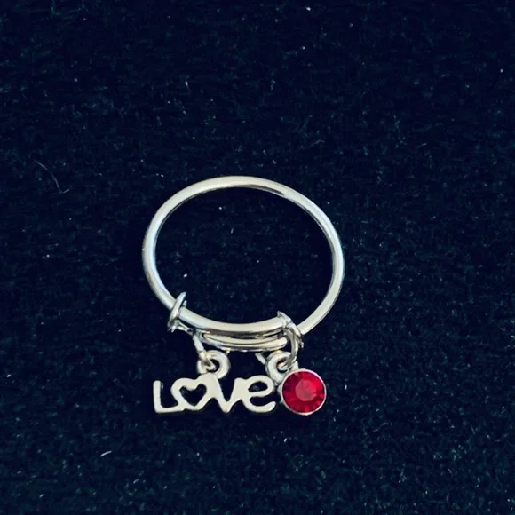 “Love” charm dangle ring with birthstone charm