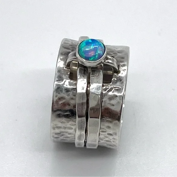 Silpada 925 Hammered Sterling Silver Spinner Ring with Faux Opal accent