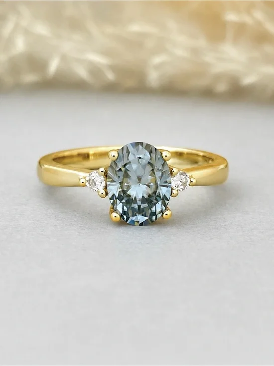Gold Three Stone Oval Light Gray Blue Moissanite Diamond Sterling Silver Ring
