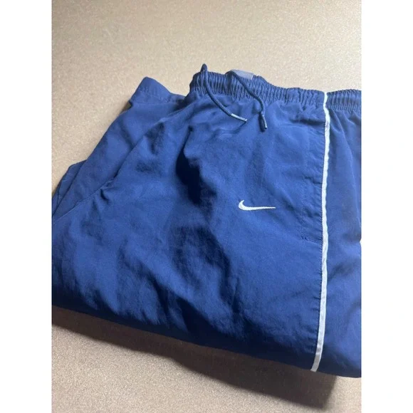 Nike Mens Navy Blue Mesh Lined Track Pants Windbreaker‎ Zipper Leg Swoosh L Vtg