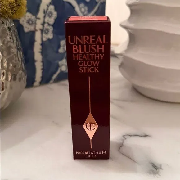 Charlotte Tilbury Unreal Lip + Cheek Glow Blush Stick with Hyaluronic Acid