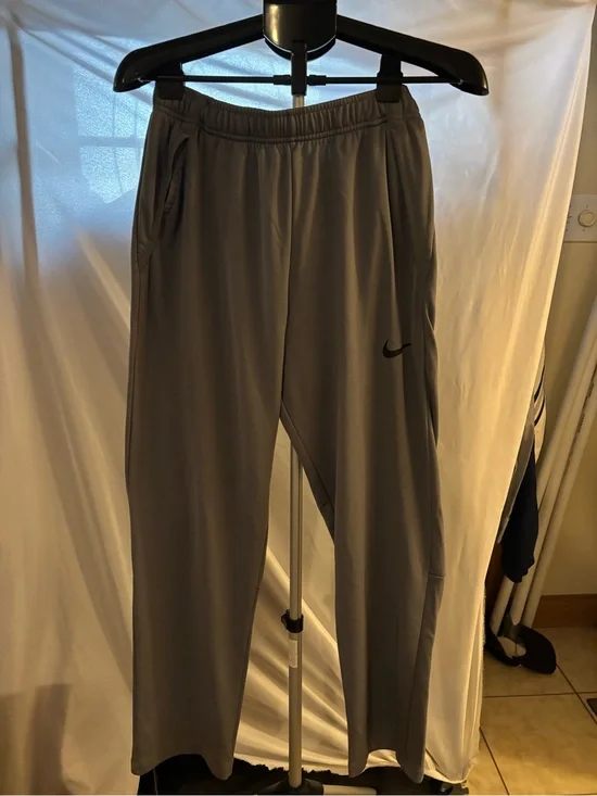 Nike Men's Gray Athletic Joggers with Black Swoosh