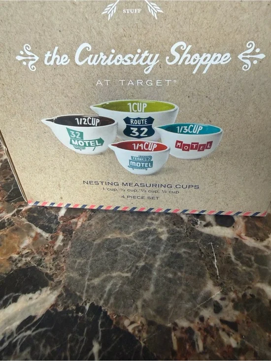 The Curiosity Shoppe Nesting Measuring Cups - Multicolor