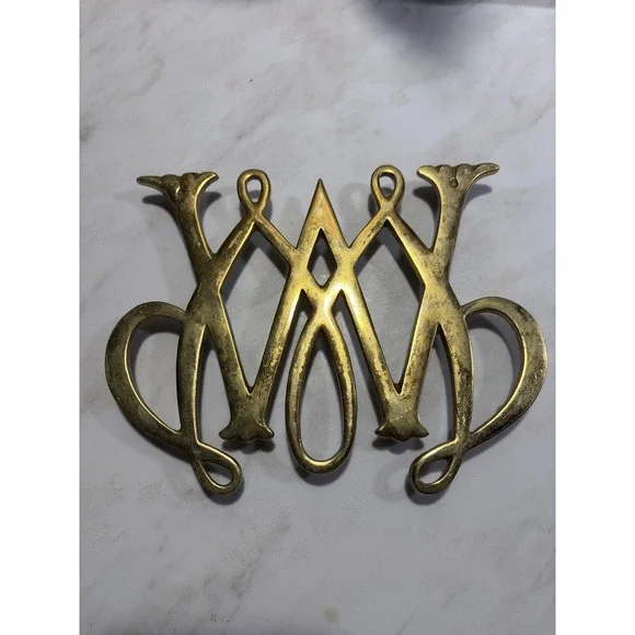 Virginia Metalcrafters Trivet OS Brass William & Mary Cypher