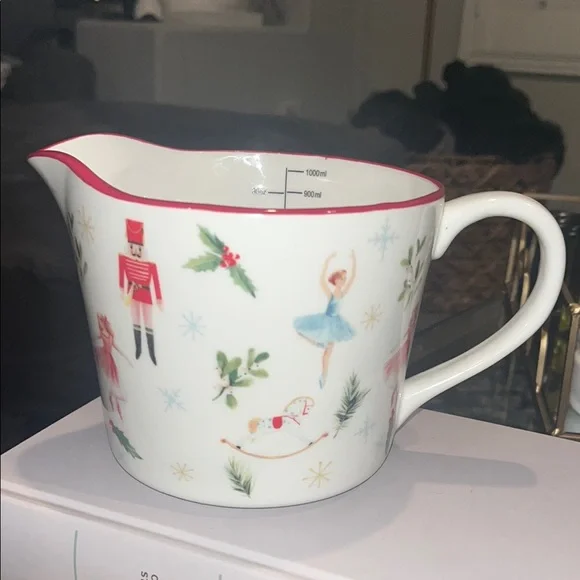 Festive Ceramic Pitcher with Nutcracker Design