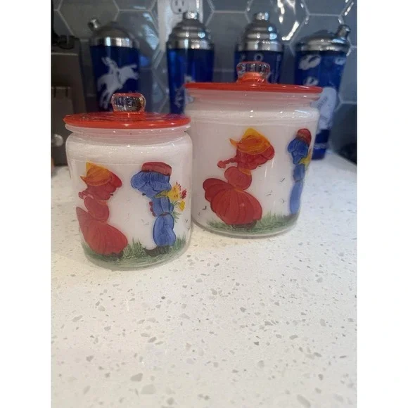 Set Of 2 Anchor Hocking Mid Century Hand Painted Dutch Girl Boy Glass Canisters