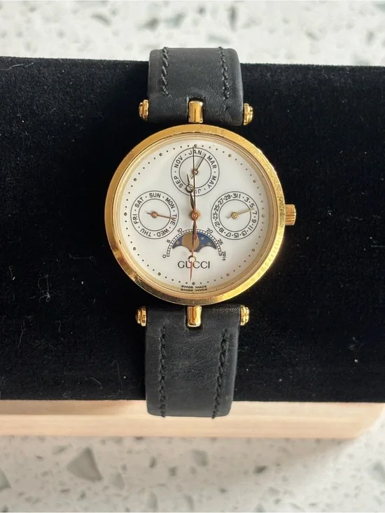 Gucci Gold-Tone Case White Dial Black Leather Strap Watch
