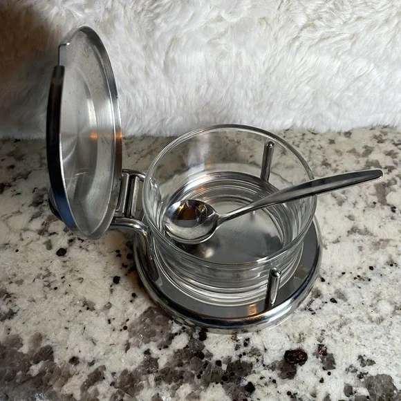 Vintage Parmesan cheese dish with spoon