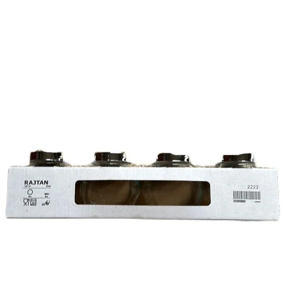 IKEA set of four Rajtan glass spice jars with silver lids