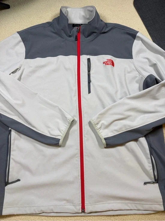 The North Face Men’s Gray Jacket with Red Zipper