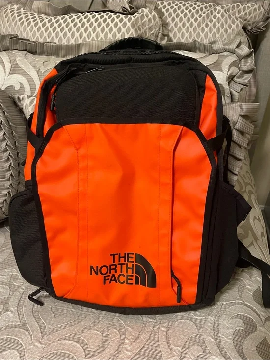 The North Face Orange and Black Backpack
