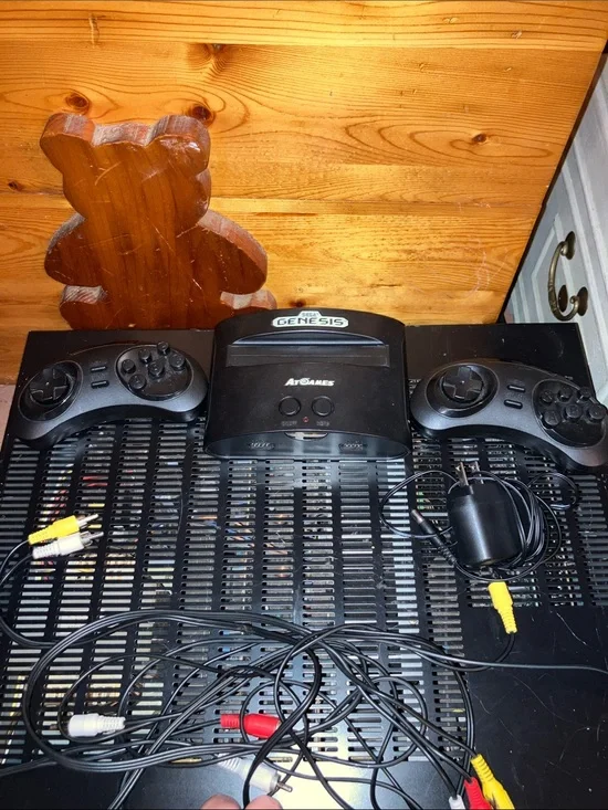 Sega Genesis Mini Console with 2 remotes and all cords. Works well!