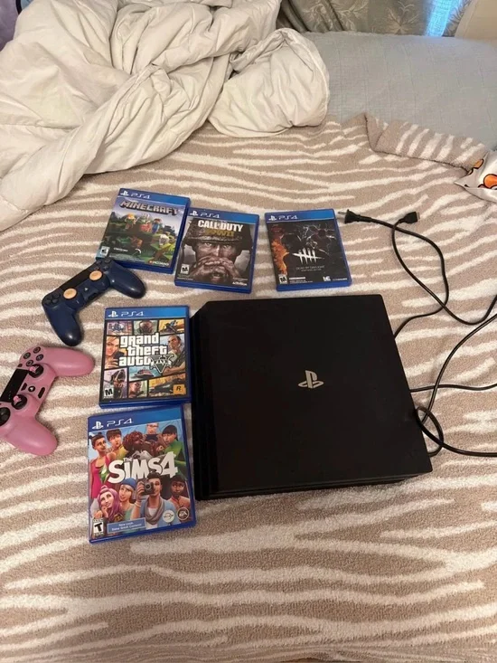 Sony PlayStation 4 Slim Black Console with Pink & Blue Controllers and Games