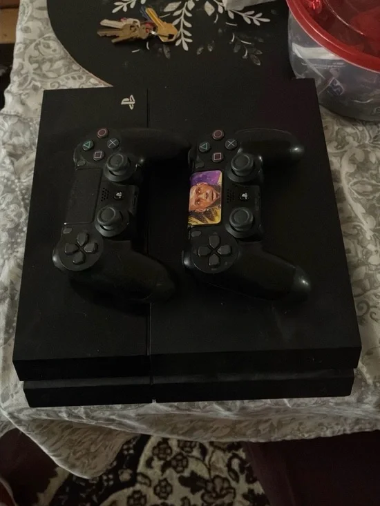 Sony Black PlayStation 4 Pro Console with Two Black Controllers