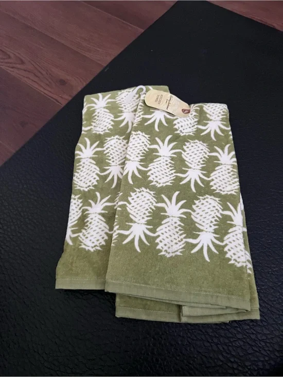 Tommy Bahama dish towels.Green Pineapple Print Kitchen Towel - White Pineapples
