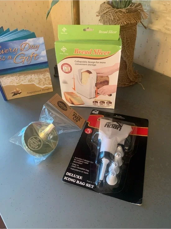 PACKAGE DEAL, 3 NEW NEVER USED, Icing bag, bread slicer and pour lid.