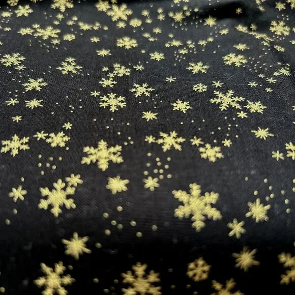 Wonders of Winter Black Gold Snowflake Quilting Fabric Laurie Godin Northcott