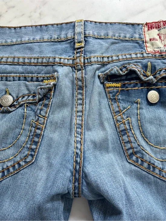 True Religion Light Blue Boot Cut Jeans with Signature Pocket Stitch