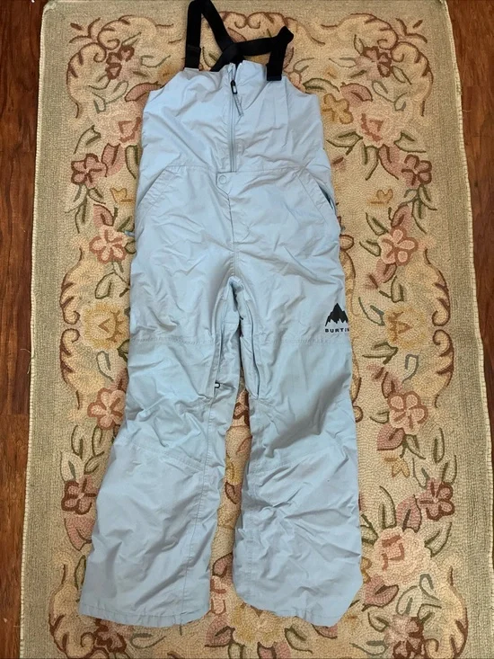 Burton Light Blue Snow Bibs Girls Size 10.  “Room to grow” feature.