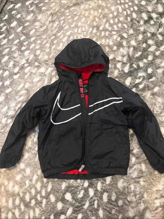 Nike Kids Black Hooded Jacket with Red Lining and White Swoosh
