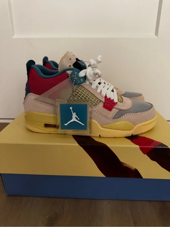 Jordan 4 Union Guava Ice. Size 6.5. Brand new with box.
