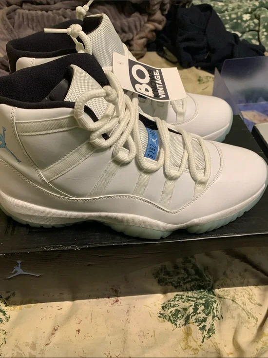 Jordan 11 men’s White High-Top Sneakers carolina blue