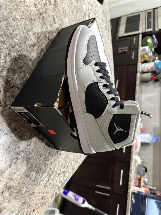 Jordan Black and White Mid-Top Basketball Sneakers