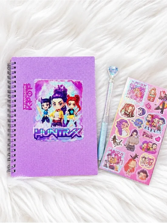 Purple HUNTRX Spiral Notebook with Character Graphic