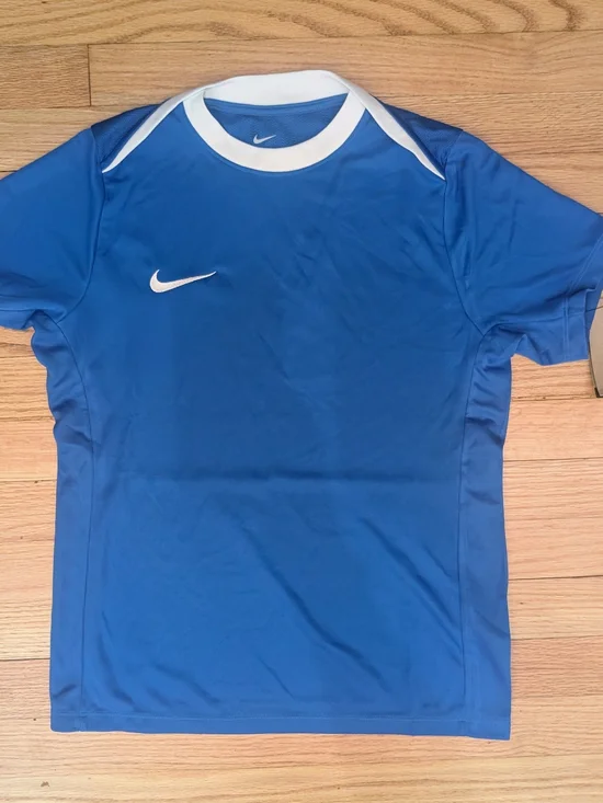 Nike Dri-Fit blue soccer jersey with white collar and white Nike swoosh, size S